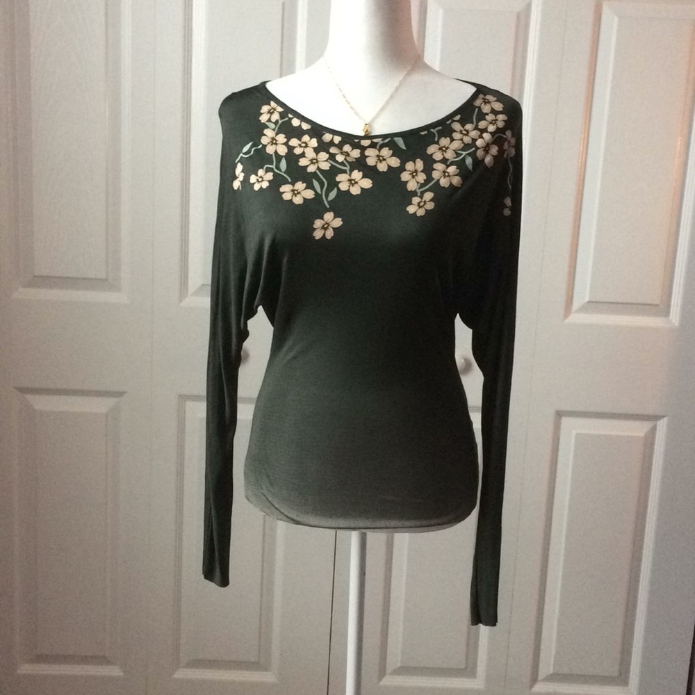 NAF NAF top with flowers 🌸 painted neck line